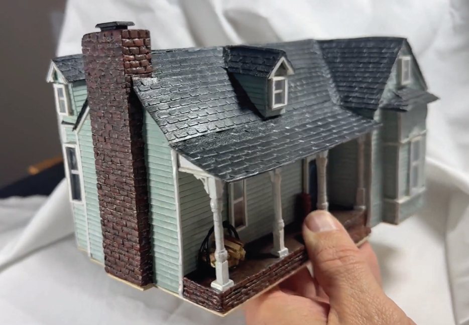Commission in progress: hand-built miniature of the Columbia home with a brick chimney and front porch